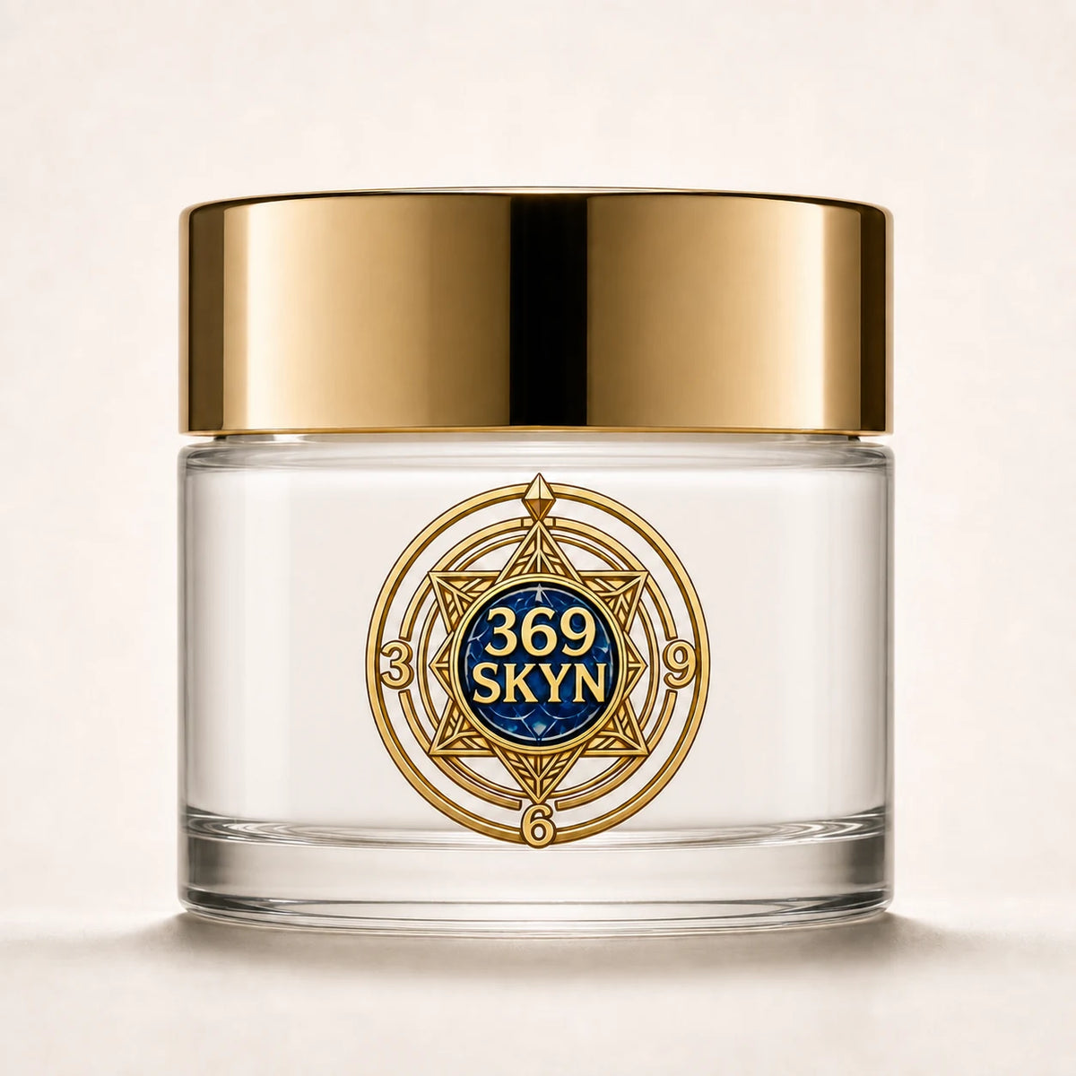 369 SKYN Age Renewal Cream with white cream in a clear glass jar and polished gold lid