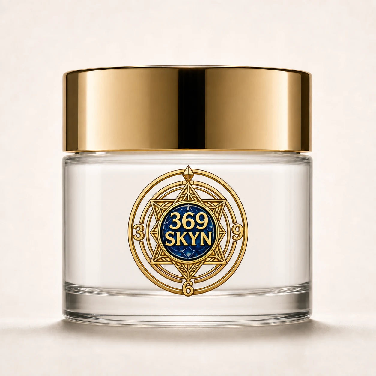 369 SKYN Age Renewal Cream with white cream in a clear glass jar and polished gold lid